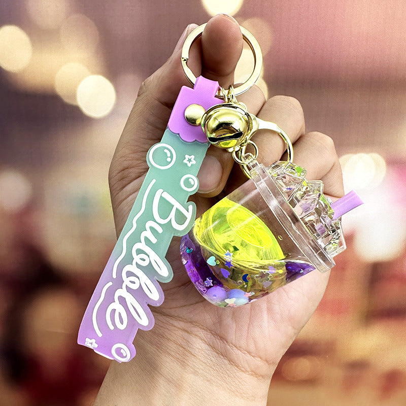 Wholesale Acrylic Oil Flashing Lamp Colorful Bean Iceberg Cup Floating Bottle Keychain